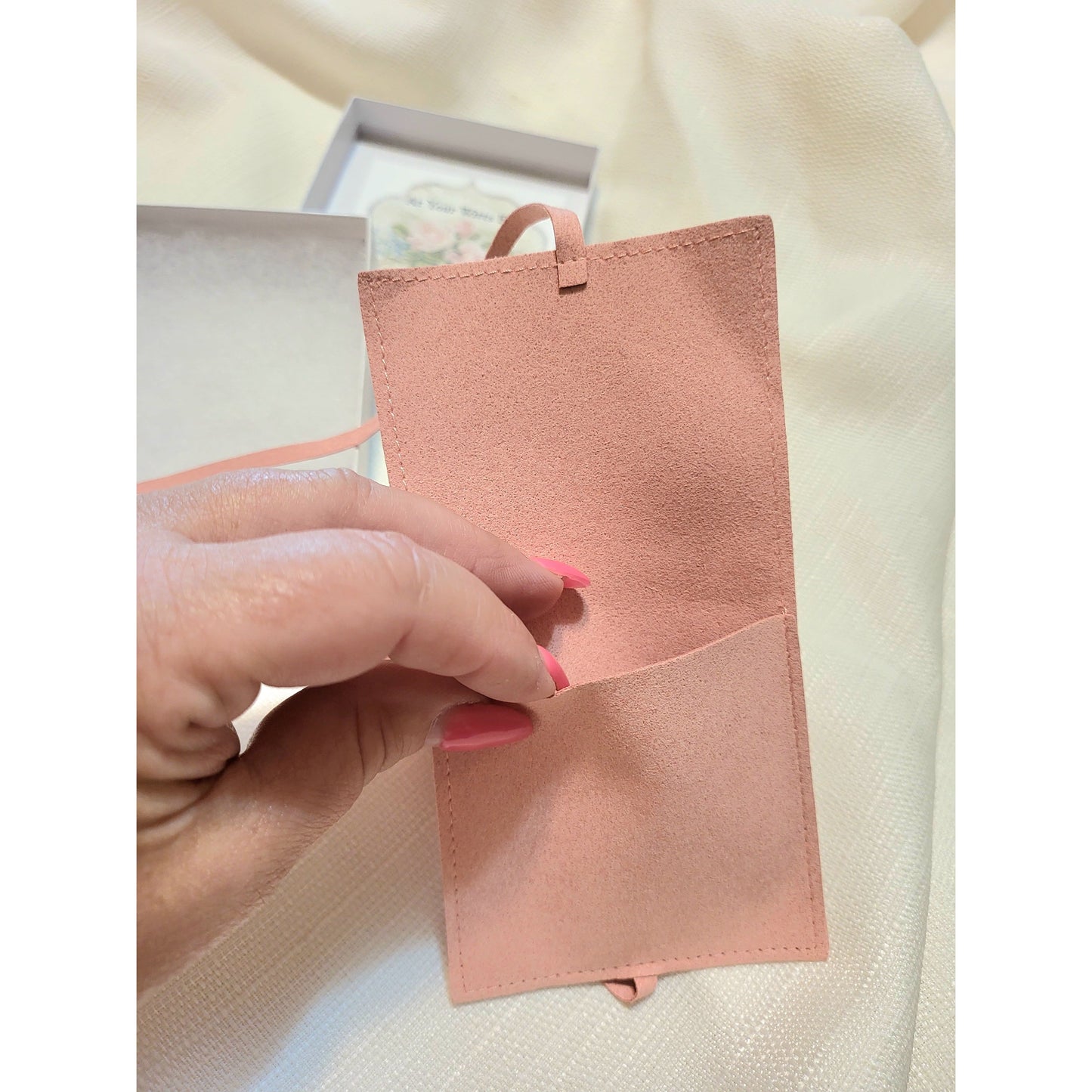 A nice soft suede pouch to keep your bracelet safe when not wearing.