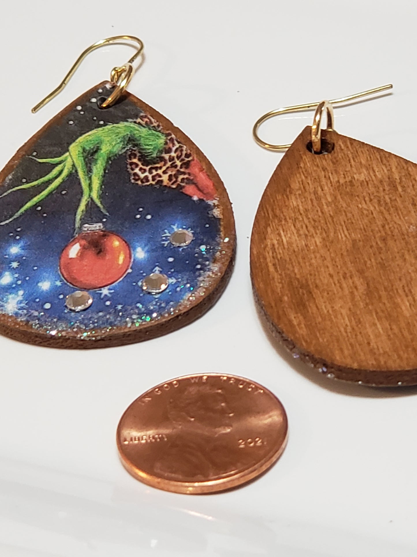 Wooded Decoupage Earrings (Grinch hand with ball)