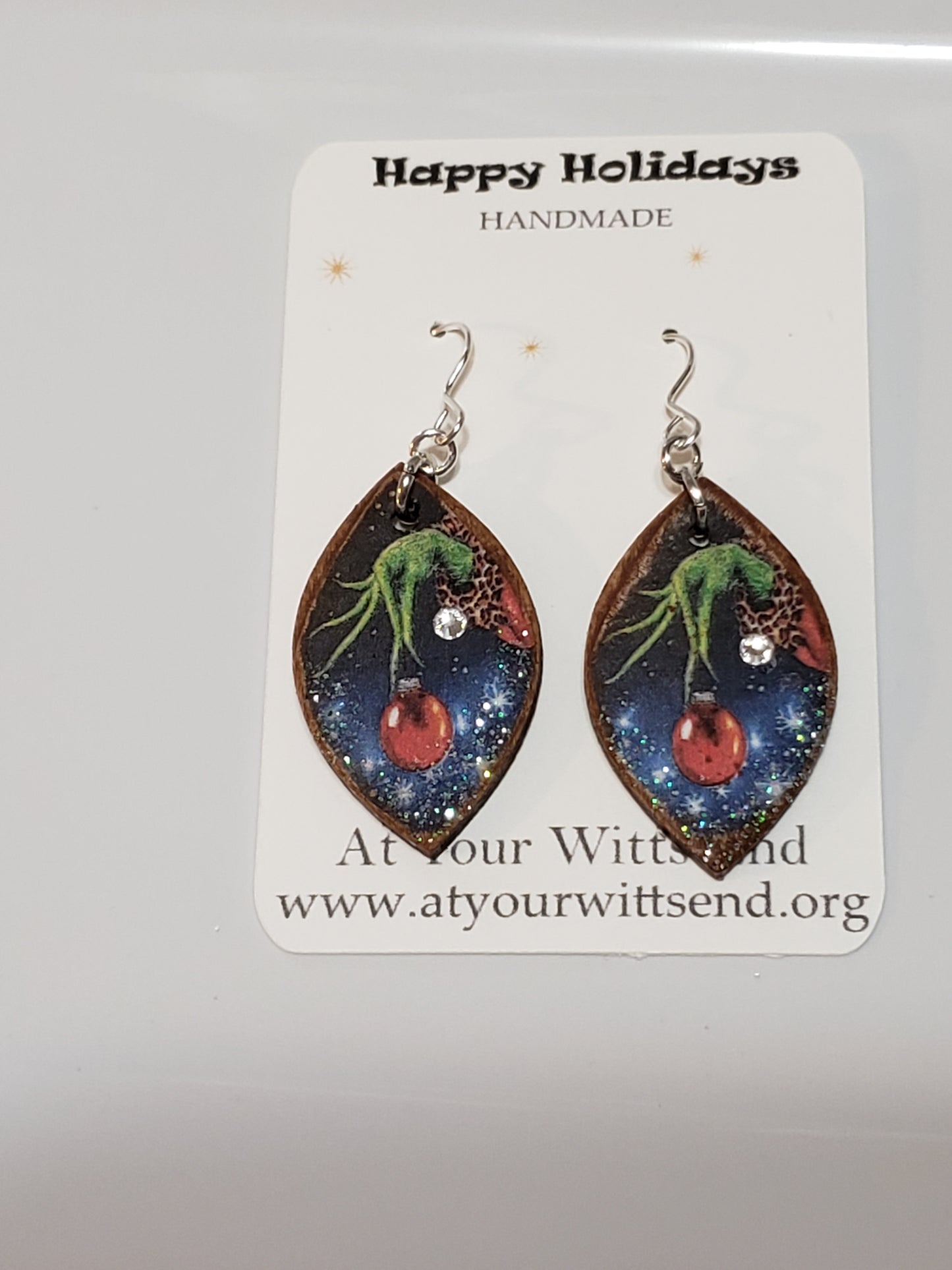 Wooded Decoupage Earrings (Grinch hand with ball)
