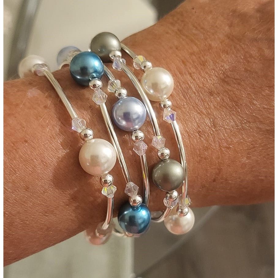 Stacking multiple bracelets in multiple colors is a fun way to show off your blessings.