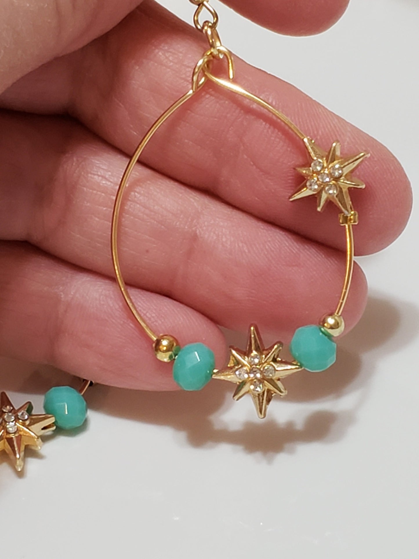 Oblong Hoop earrings with Gold Stars and Pink Beads