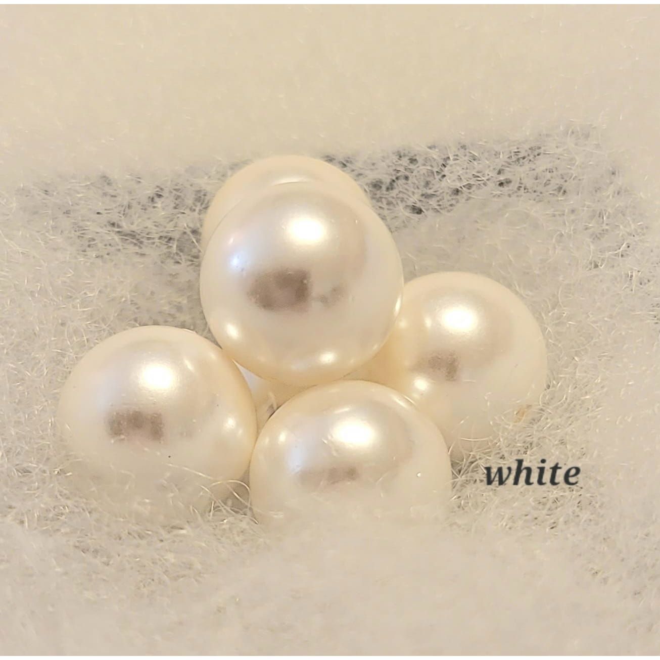 These are delicate white pearls.