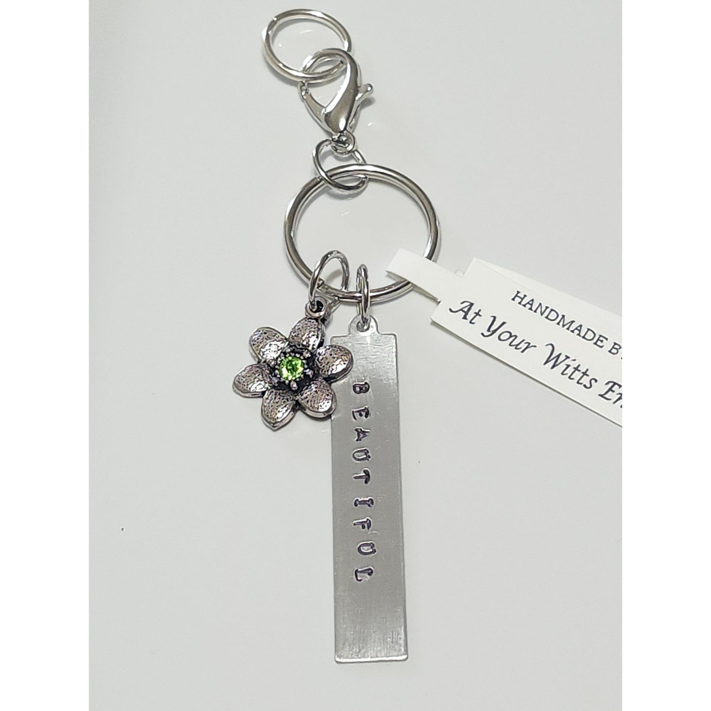 Silver Tone Flower with Green Rhinestone keychain with saying