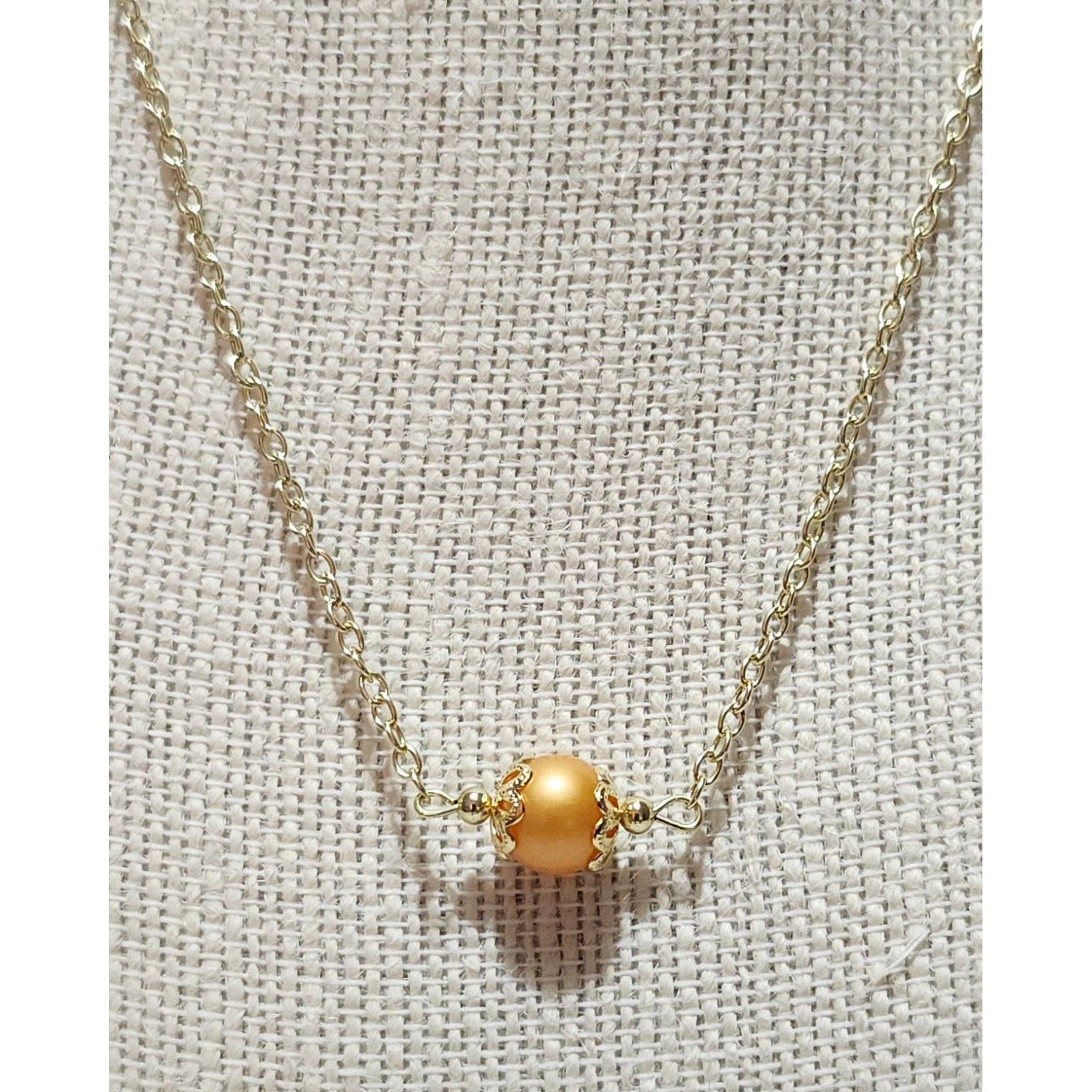 Beautiful Orange Solo Bead on Gold Chain