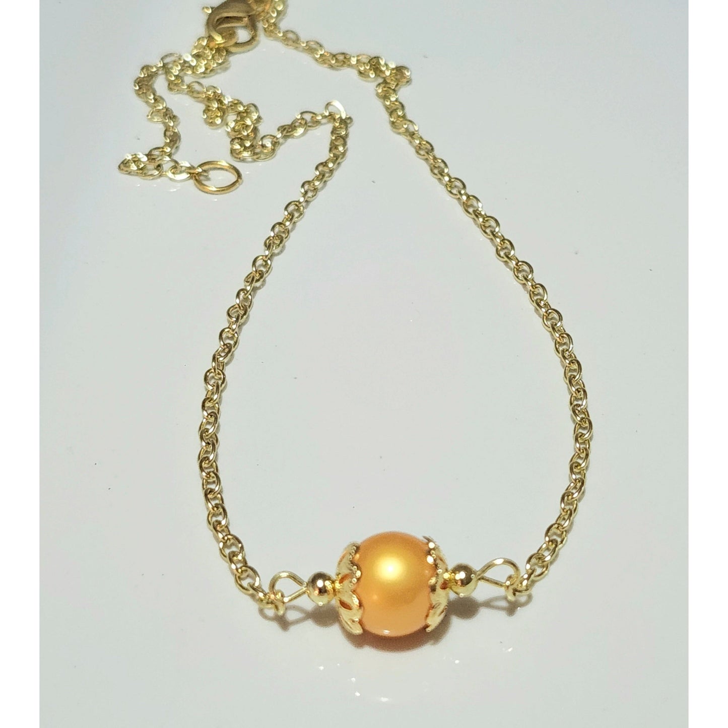 Beautiful Orange Solo Bead on Gold Chain