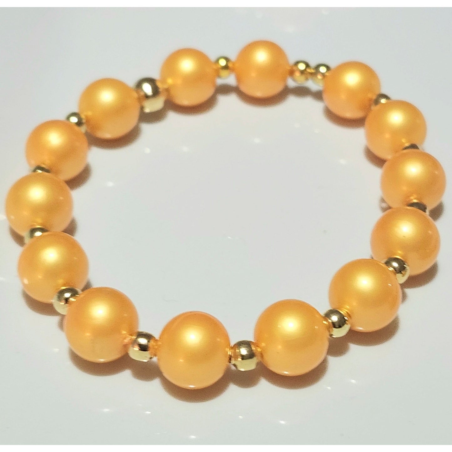 Beautiful Orange Solo Bead on Gold Chain