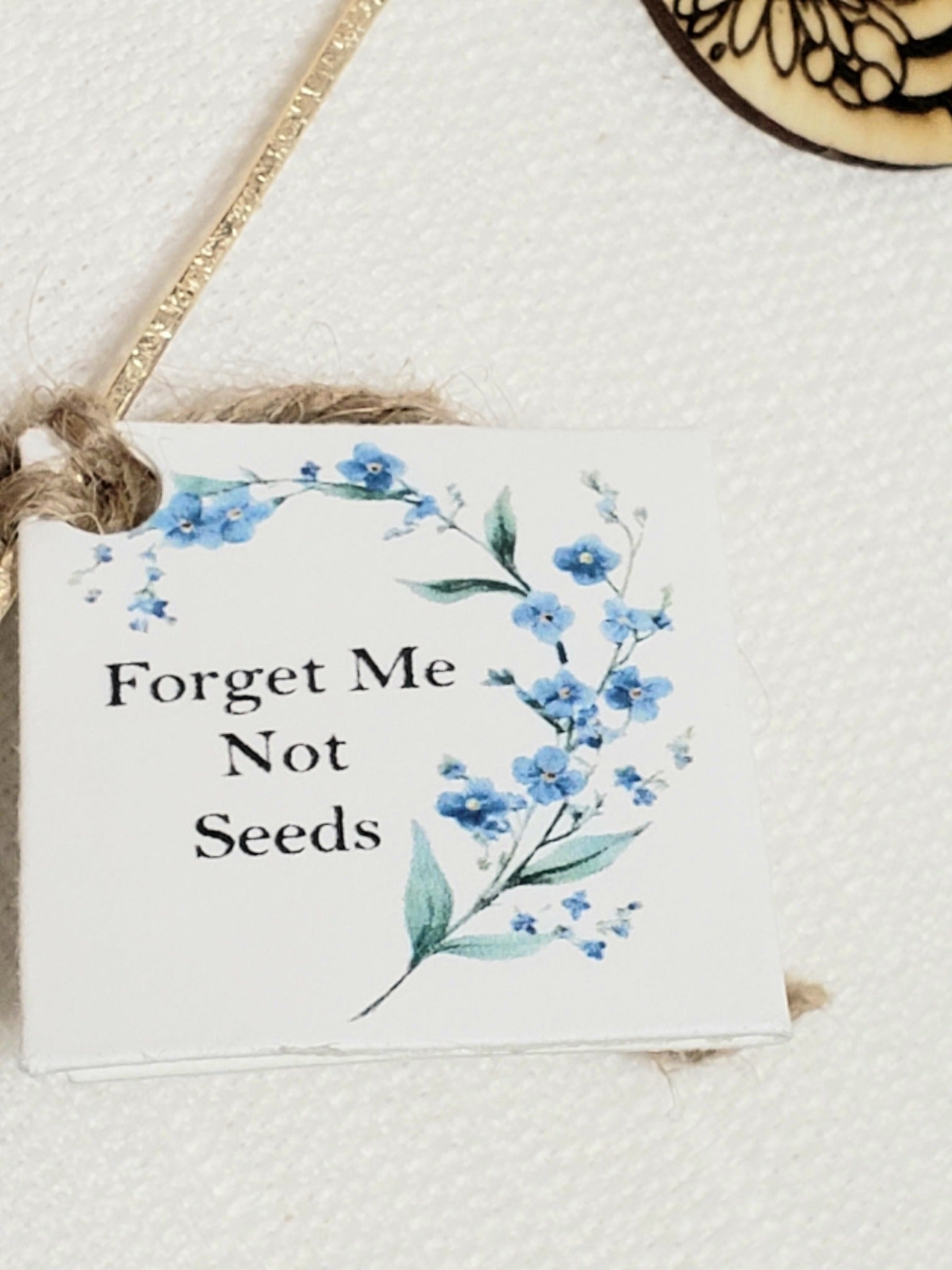 Cute tiny handmade envelope with forget me not seeds in it. 