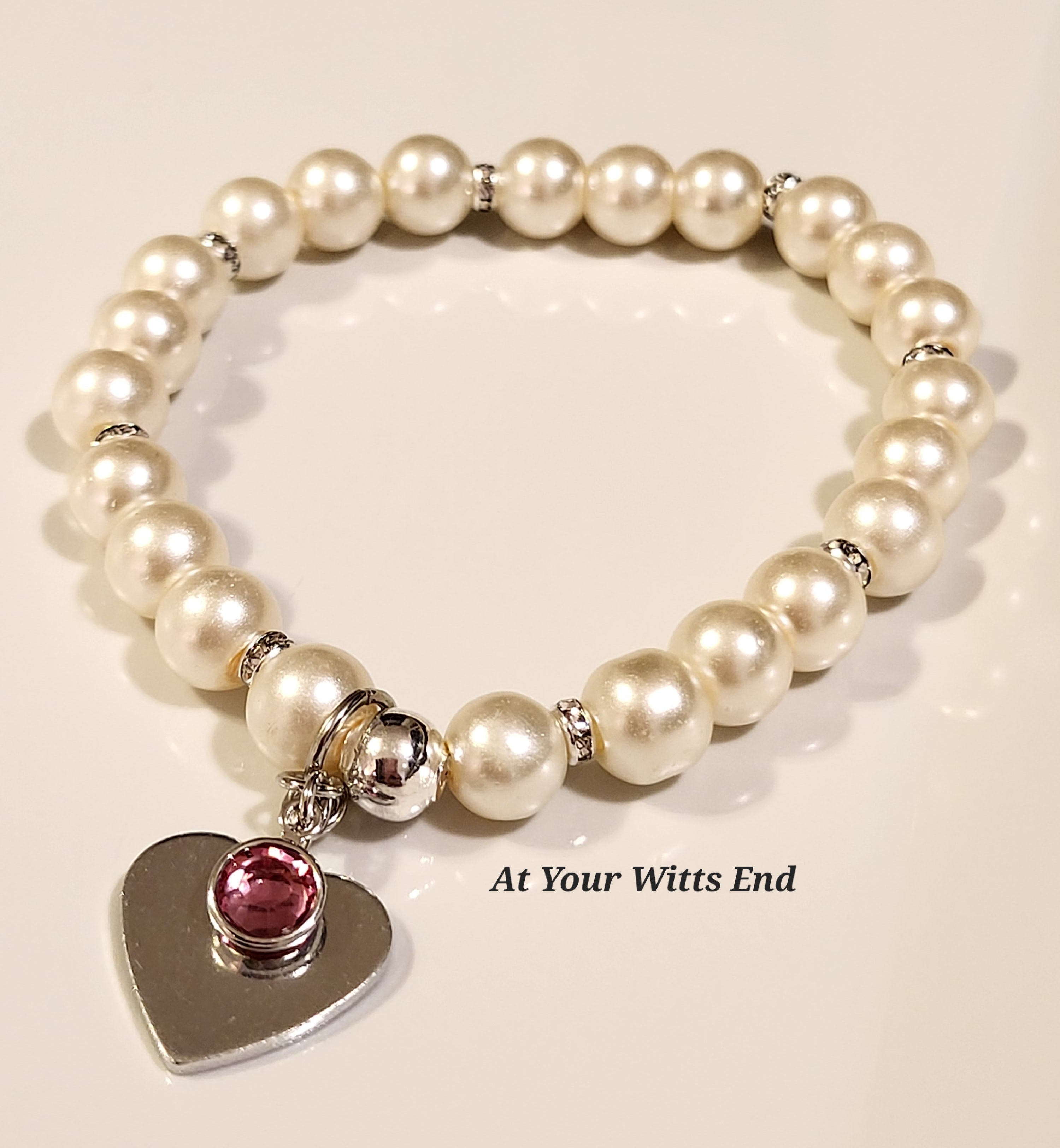 Pearl bracelet pink pearls and pearl charm. Modern pearl jewelry